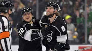 Mar 26, 2023; Los Angeles, California, USA;   Los Angeles Kings right wing Adrian Kempe (9) is congratulated by left wing Trevor Moore (12) after scoring a goal in the first period against the St. Louis Bluesat Crypto.com Arena. Mandatory Credit: Jayne Kamin-Oncea-Imagn Images