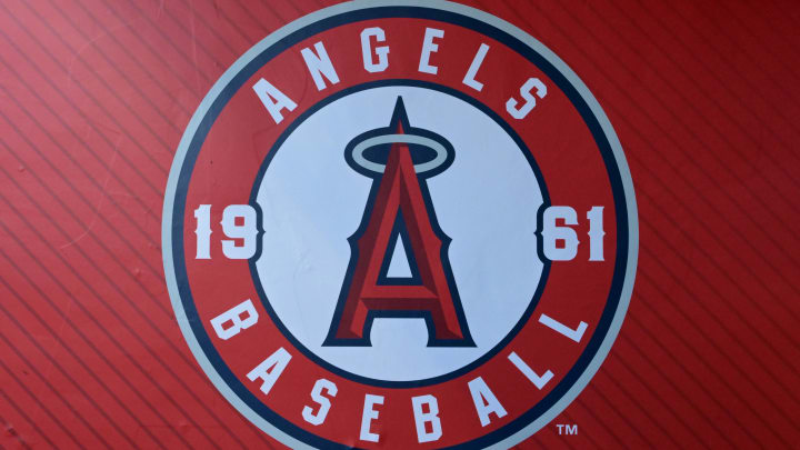 Jul 21, 2023; Anaheim, California, USA;  Detailed view of the Los Angeles Angels team logo on the wall of the dugout at Angel Stadium. Mandatory Credit: Jayne Kamin-Oncea-USA TODAY Sports