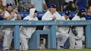Sep 18, 2023; Los Angeles, California, USA;  Los Angeles Dodgers starting pitcher Clayton Kershaw (22), starting pitcher Ryan Pepiot (47), starting pitcher Emmet Sheehan (80), starting pitcher Gavin Stone (71) and starting pitcher Tony Gonsolin (26) look on from the dugout during the game against the Detroit Tigers at Dodger Stadium. Mandatory Credit: Jayne Kamin-Oncea-Imagn Images