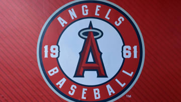 Jul 21, 2023; Anaheim, California, USA;  Detailed view of the Los Angeles Angels team logo on the wall of the dugout at Angel Stadium. Mandatory Credit: Jayne Kamin-Oncea-USA TODAY Sports