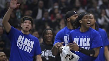 Feb 10, 2023; Los Angeles, California, USA;   Los Angeles Clippers guard Jason Preston (0) forward Marcus Morris Sr. (8) and Los Angeles Clippers guard Terance Mann (14) react after a basket in the first half against the Milwaukee Bucks at Crypto.com Arena. Mandatory Credit: Jayne Kamin-Oncea-Imagn Images