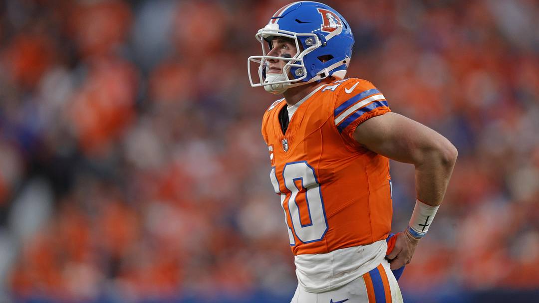 Jan 4, 2026; Denver, Colorado, USA; Denver Broncos quarterback Bo Nix (10) looks on during the second half against the Los Angeles Chargers at Empower Field at Mile High. Mandatory Credit: Isaiah J. Downing-Imagn Images