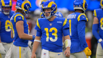 Nov 13, 2022; Inglewood, California, USA;  Los Angeles Rams quarterback John Wolford (13) looks on from the field in the first half against the Arizona Cardinals at SoFi Stadium. Mandatory Credit: Jayne Kamin-Oncea-USA TODAY Sports