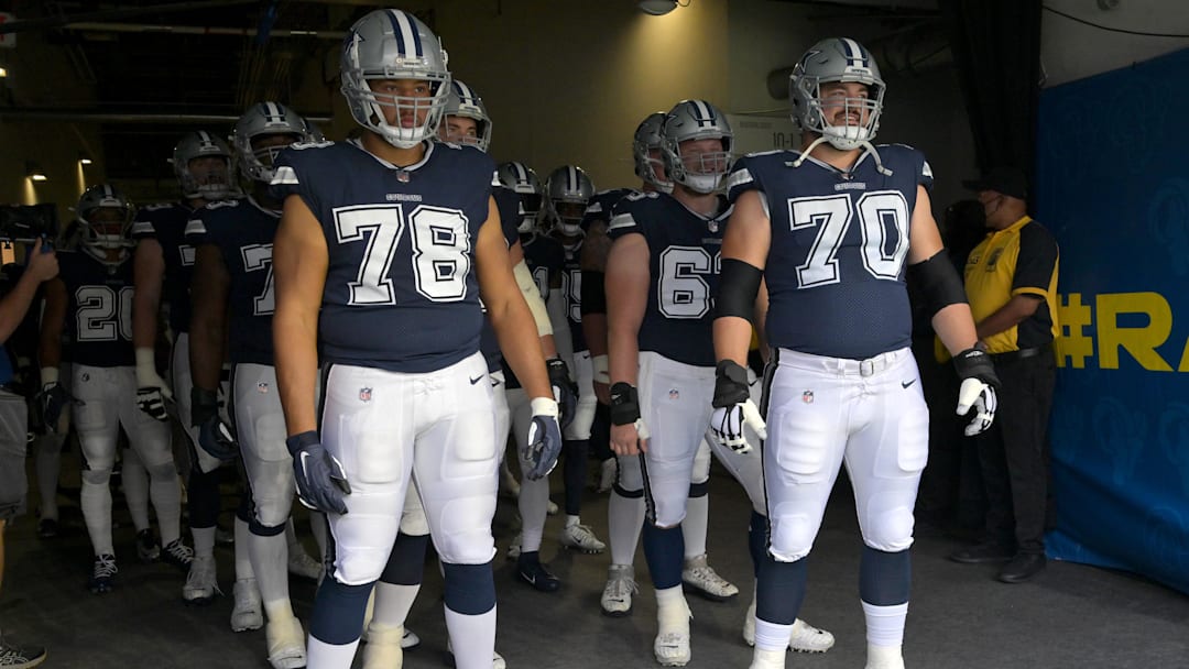 Oct 9, 2022; Inglewood, California, USA; Dallas Cowboys offensive tackle Terence Steele (78) and guard Zack Martin (70) enter the field for the game against the Los Angeles Rams at SoFi Stadium. Mandatory Credit: Jayne Kamin-Oncea-Imagn Images