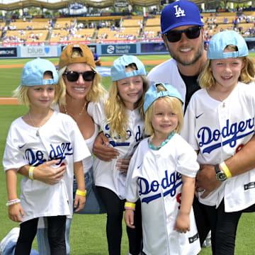 Sep 3, 2023; Los Angeles, California, USA;   Los Angeles Rams quarterback Matthew Stafford (9) with his wife Kelly with their 4 daughters on the field prior to the game between the Los Angeles Dodgers and the Atlanta Braves at Dodger Stadium. Stafford was at the game on Rams day. Mandatory Credit: Jayne Kamin-Oncea-Imagn Images