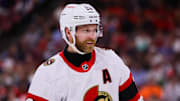Apr 9, 2024; Sunrise, Florida, USA; Ottawa Senators right wing Claude Giroux (28) looks on against the Florida Panthers during the second period at Amerant Bank Arena. Mandatory Credit: Sam Navarro-Imagn Images