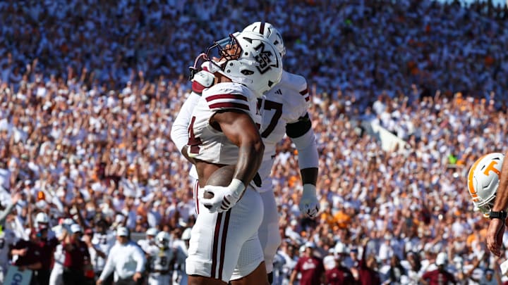 Sep 27, 2025; Starkville, Mississippi, USA; Mississippi State Bulldogs running back Fluff Bothwell (24) celebrates after a touchdown against the Tennessee Volunteers during the first half at Davis Wade Stadium at Scott Field. Mandatory Credit: Wesley Hale-Imagn Images