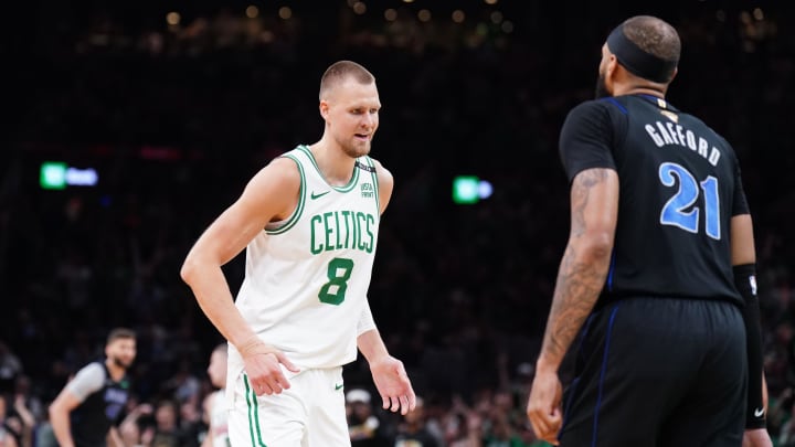 Boston Celtics center Kristaps Porzingis reacts in the first quarter against the Dallas Mavericks during Game 1 of the 2024 NBA Finals at TD Garden.