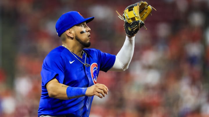 Jul 30, 2024; Cincinnati, Ohio, USA; Chicago Cubs third baseman Isaac Paredes (17) fields the ball hit by Cincinnati Reds third baseman Noelvi Marte (not pictured) in the sixth inning at Great American Ball Park.