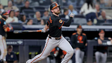 Sep 26, 2025; Bronx, New York, USA; Baltimore Orioles third baseman Jordan Westburg (11) follows through on a single against the New York Yankees during the fifth inning at Yankee Stadium. Mandatory Credit: Brad Penner-Imagn Images