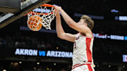 Arizona forward Henri Veesaar (13) dunks the ball against the Akron Zips during the Wildcats' first-round NCAA Tournament game at Climate Pledge Arena in Seattle.