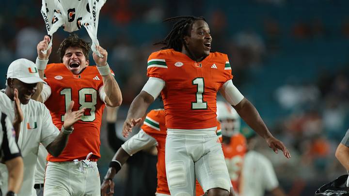 Sep 10, 2026; Miami Gardens, Florida, USA;  Miami Hurricanes wide receiver Malachi Toney (1) reacts to a touchdown scored by wide receiver Vance Spafford (13) in the third quarter against the Florida A&M Rattlers at Hard Rock Stadium.  Mandatory Credit: Sam Navarro-Imagn Images