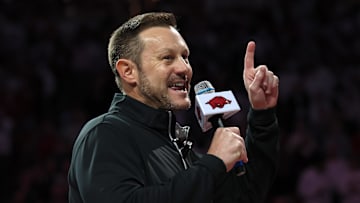 Dec 3, 2025; Fayetteville, Arkansas, USA; Arkansas Razorbacks new head football coach Ryan Silverfield speaks to the crowd during halftime against the Louisville Cardinals at Bud Walton Arena. Mandatory Credit: Nelson Chenault-Imagn Images