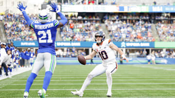 Sep 8, 2024; Seattle, Washington, USA; Denver Broncos quarterback Bo Nix (10) rushes for a touchdown against the Seattle Seahawks during the fourth quarter at Lumen Field.