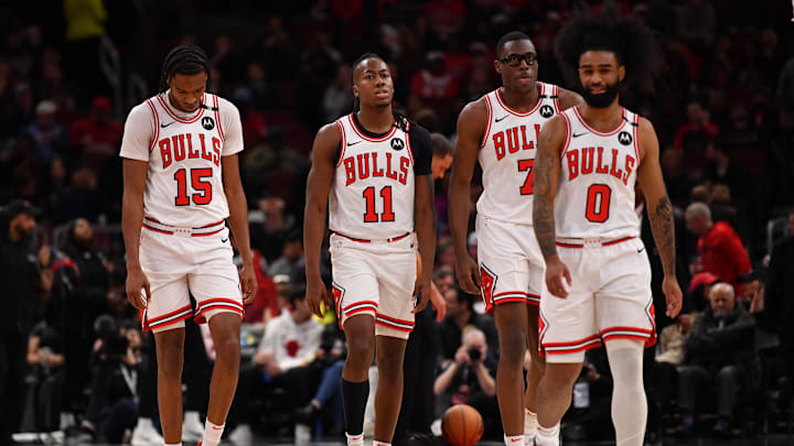 Feb 28, 2025; Chicago, Illinois, USA; (from left to right) Chicago Bulls forward Julian Phillips, guard Ayo Dosunmu, forward Jalen Smith, and guard Coby White are seen during a game against the Toronto Raptors at the United Center. Mandatory Credit: Patrick Gorski-Imagn Images