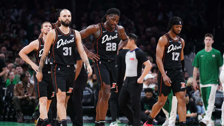 Mar 18, 2024; Boston, Massachusetts, USA; Detroit Pistons guard Evan Fournier (31), center Isaiah Stewart (28) and guard Stanley Umude (17) head to the bench during a timeout against the Boston Celtics in the first quarter at TD Garden. Mandatory Credit: David Butler II-USA TODAY Sports