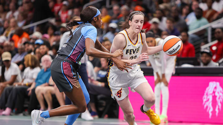 Indiana Fever guard Caitlin Clark drives to the basket against the Atlanta Dream.