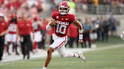 Aug 29, 2024; Little Rock, Arkansas, USA; Arkansas Razorbacks quarterback Taylen Green (10) rushes during the first quarter against the Pine Bluff Golden Lions at War Memorial Stadium. Mandatory Credit: Nelson Chenault-Imagn Images