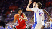 Jan 25, 2025; Gainesville, Florida, USA; Georgia Bulldogs forward Asa Newell (14) posts up against Florida Gators forward Alex Condon (21) during the first half at Exactech Arena at the Stephen C. O'Connell Center. Mandatory Credit: Matt Pendleton-Imagn Images