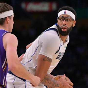 Mavericks forward Anthony Davis returned from a calf injury to face his former team in the Lakers for the first time since he was traded in February.