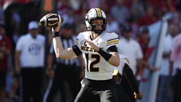 Oct 26, 2024; Tuscaloosa, Alabama, USA;  Missouri Tigers quarterback Brady Cook (12) throws a pass during the first half against the Alabama Crimson Tide at Bryant-Denny Stadium. Mandatory Credit: Butch Dill-Imagn Images