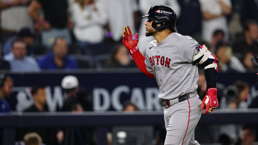 Sep 30, 2026; Bronx, New York, USA;  Boston Red Sox first baseman Willson Contreras (40) celebrates after hitting a solo home run in the sixth inning against the New York Yankees during game two of the Wildcard round for the 2026 MLB Playoffs at Yankee Stadium.  Mandatory Credit: Vincent Carchietta-Imagn Images