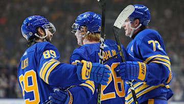 Apr 5, 2024; Buffalo, New York, USA;  Buffalo Sabres defenseman Rasmus Dahlin (26)ncelebrates his goal with teammates during the second period against the Philadelphia Flyers at KeyBank Center. Mandatory Credit: Timothy T. Ludwig-Imagn Images