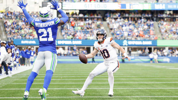 Sep 8, 2024; Seattle, Washington, USA; Denver Broncos quarterback Bo Nix (10) rushes for a touchdown against Seattle