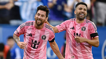Inter Miami CF players Lionel Messi and Jordi Alba celebrate Saturday after one of Messi's two goals against CF Montreal.