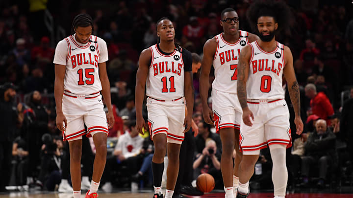 Feb 28, 2025; Chicago, Illinois, USA; (from left to right) Chicago Bulls forward Julian Phillips, guard Ayo Dosunmu, forward Jalen Smith, and guard Coby White are seen during a game against the Toronto Raptors at the United Center. Mandatory Credit: Patrick Gorski-Imagn Images