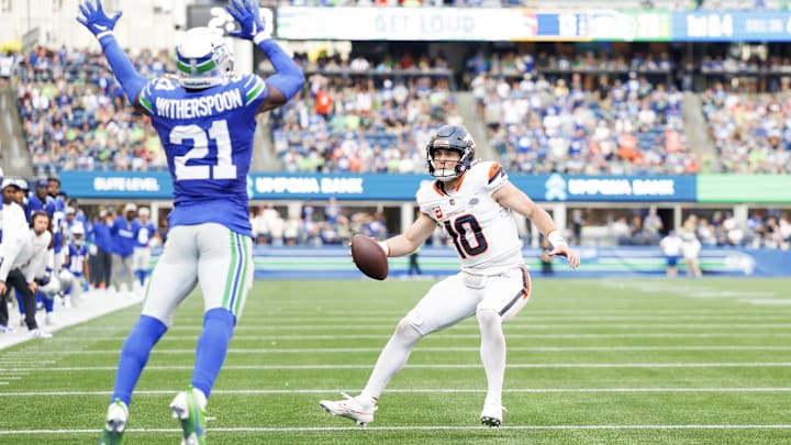 Sep 8, 2024; Seattle, Washington, USA; Denver Broncos quarterback Bo Nix (10) rushes for a touchdown against the Seattle Seahawks during the fourth quarter at Lumen Field. 