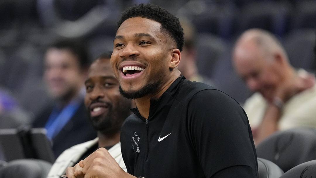 Apr 10, 2026; Milwaukee, Wisconsin, USA;  Milwaukee Bucks forward Giannis Antetokounmpo enjoys a moment during warmups prior to the game against the Brooklyn Nets at Fiserv Forum. Mandatory Credit: Jeff Hanisch-Imagn Images