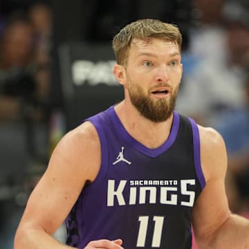 Apr 11, 2025; Sacramento, California, USA; Sacramento Kings forward Domantas Sabonis (11) dribbles against the Los Angeles Clippers during the second quarter at Golden 1 Center. Mandatory Credit: Darren Yamashita-Imagn Images