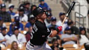 Chicago White Sox infielder Chase Meidroth hits against the Los Angeles Dodgers at Camelback Ranch-Glendale. 