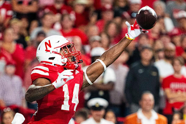 Nebraska running back Rahmir Johnson catches a pass against Colorado.