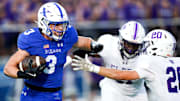 St. Xavier Bombers Daniel Vollmer (3) runs the ball in the first half of a high school football game between the St. Xavier Bombers and Elder Panthers, Friday, Sept. 26, 2025, at RDI Stadium in Cincinnati.