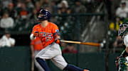 Sep 24, 2025; West Sacramento, California, USA; Houston Astros second baseman Jose Altuve (27) hits a fly ball against the Athletics in the sixth inning at Sutter Health Park. 