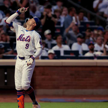 Jun 25, 2024; New York City, New York, USA; New York Mets left fielder Brandon Nimmo (9) reacts after hitting a two run home run against the New York Yankees during the fourth inning at Citi Field.