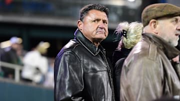 Nov 12, 2022; New Orleans, Louisiana, USA; LSU Tigers former head coach Ed Orgeron watches a game between the Tulane Green Wave and the UCF Knights from the sidelines at Yulman Stadium. Mandatory Credit: Rebecca Warren-Imagn Images