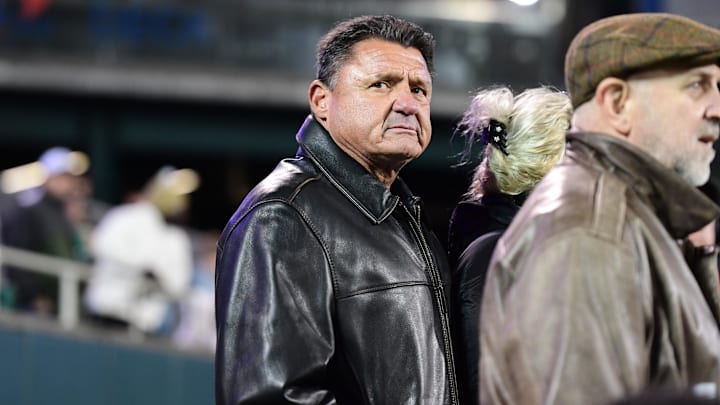 Nov 12, 2022; New Orleans, Louisiana, USA; LSU Tigers former head coach Ed Orgeron watches a game between the Tulane Green Wave and the UCF Knights from the sidelines at Yulman Stadium. Mandatory Credit: Rebecca Warren-Imagn Images
