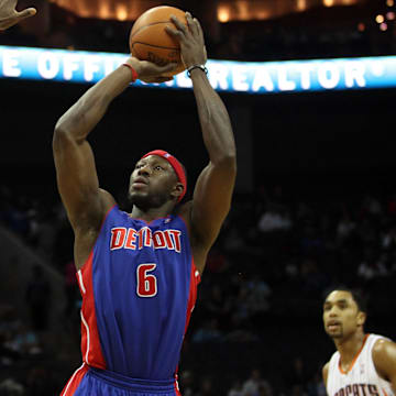 Apr 12, 2012; Charlotte, NC, USA  Detroit Pistons center Ben Wallace (6) shoots the ball while being defended by Charlotte Bobcats center Bismack Biyombo (0) during the first half at Time Warner Cable Arena. Mandatory Credit: Jeremy Brevard-Imagn Images