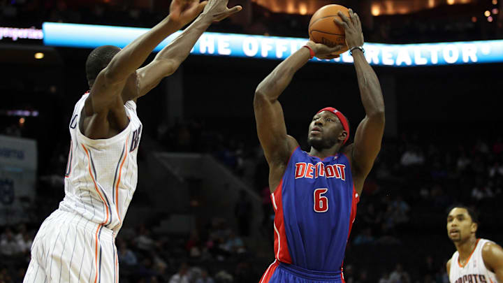 Apr 12, 2012; Charlotte, NC, USA  Detroit Pistons center Ben Wallace (6) shoots the ball while being defended by Charlotte Bobcats center Bismack Biyombo (0) during the first half at Time Warner Cable Arena. Mandatory Credit: Jeremy Brevard-Imagn Images