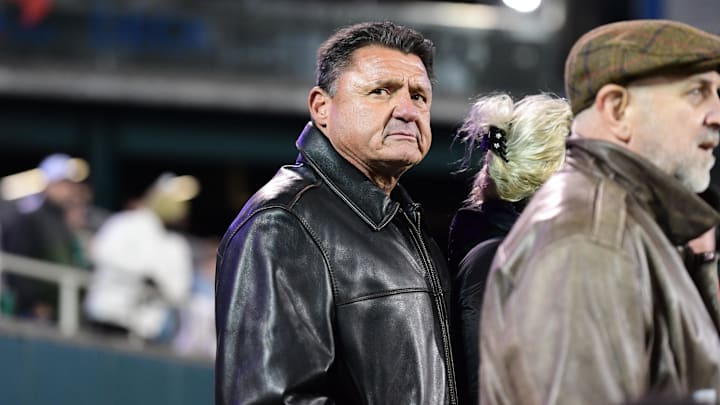 Nov 12, 2022; New Orleans, Louisiana, USA; LSU Tigers former head coach Ed Orgeron watches a game between the Tulane Green Wave and the UCF Knights from the sidelines at Yulman Stadium. Mandatory Credit: Rebecca Warren-Imagn Images