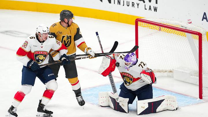 Nov 10, 2025; Las Vegas, Nevada, USA; Florida Panthers goaltender Sergei Bobrovsky (72) makes a save against Vegas Golden Knights left wing Ivan Barbashev (49) as Florida Panthers defenseman Donovan Sebrango (6) lifts his stick during the third period at T-Mobile Arena. Mandatory Credit: Stephen R. Sylvanie-Imagn Images