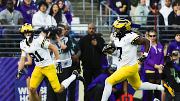 Oct 5, 2024; Seattle, Washington, USA; Michigan Wolverines running back Donovan Edwards (7) rushes for a touchdown against the Washington Huskies during the second quarter at Alaska Airlines Field at Husky Stadium. Mandatory Credit: Joe Nicholson-Imagn Images