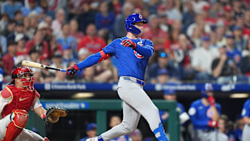 Jun 9, 2025; Philadelphia, Pennsylvania, USA; Chicago Cubs outfielder Pete Crow-Armstrong (4) hits an RBI double against the Philadelphia Phillies in the eleventh inning at Citizens Bank Park. 