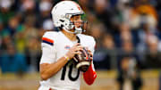 Virginia quarterback Anthony Colandrea (10) looks for an open receiver during a NCAA college football game against Notre Dame 
