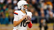 Virginia quarterback Anthony Colandrea (10) looks for an open receiver during a NCAA college football game against Notre Dame 