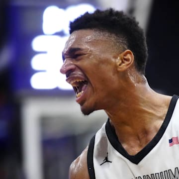 Millennium forward Cameron Holmes (3) reacts after dunking against Sunnyslope during a game at Millennium High School in Goodyear on Jan. 23, 2025.