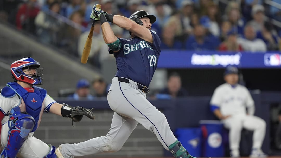 Oct 20, 2025; Toronto, Ontario, CAN; Seattle Mariners catcher Cal Raleigh (29) hits a solo home run against the Toronto Blue Jays in the fifth inning during game seven of the ALCS round for the 2025 MLB playoffs at Rogers Centre. Mandatory Credit: John E. Sokolowski-Imagn Images Oct 20, 2025; Toronto, Ontario, CAN; Seattle Mariners catcher Cal Raleigh (29) hits a solo home run against the Toronto Blue Jays in the fifth inning during game seven of the ALCS round for the 2025 MLB playoffs at Rogers Centre. Mandatory Credit: John E. Sokolowski-Imagn Images